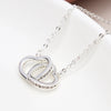 Cadwyn Calonnau Cysylltiedig Ymylon Grisial | Silver Plated Crystal Edged Linked Hearts Necklace